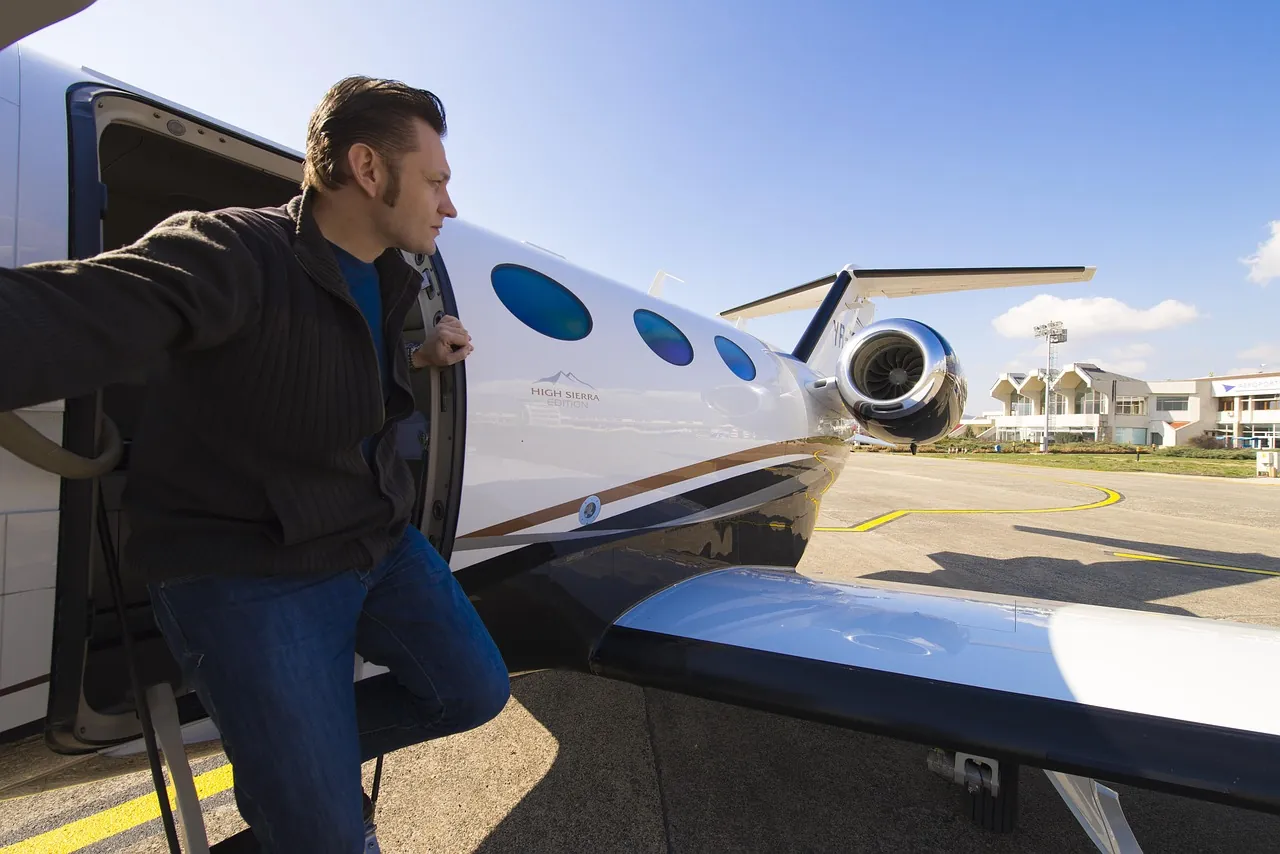 Luxury private jet cabin interior showing premium leather seats and modern amenities